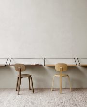 Minimal Nordic desks mounted to the wall