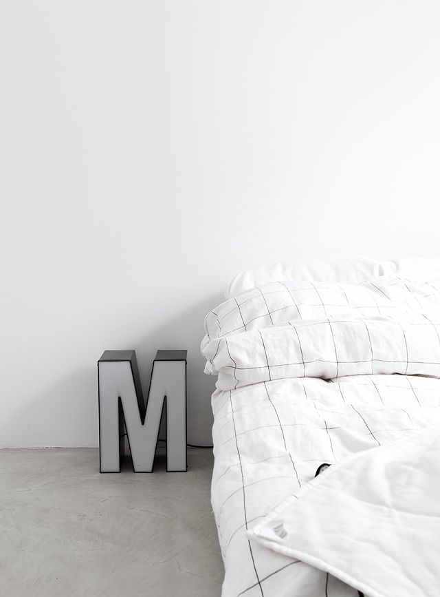 white concrete bedroom grid sheets
