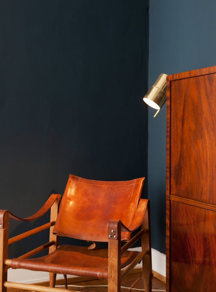 leather chair and blue wall