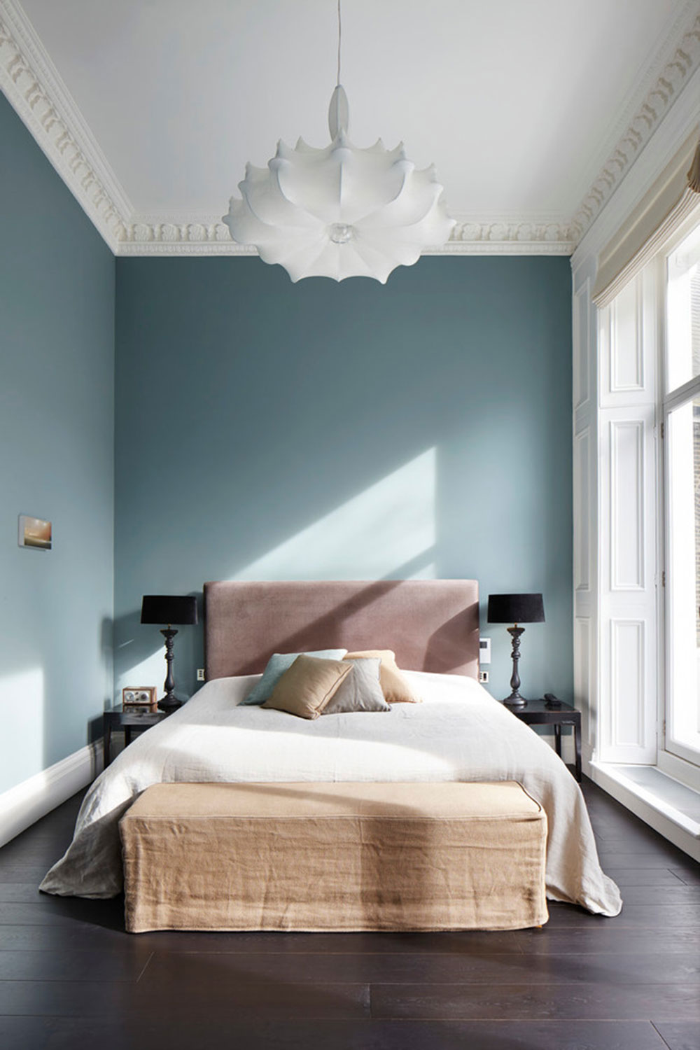 luxurious bedroom with velvet headboard