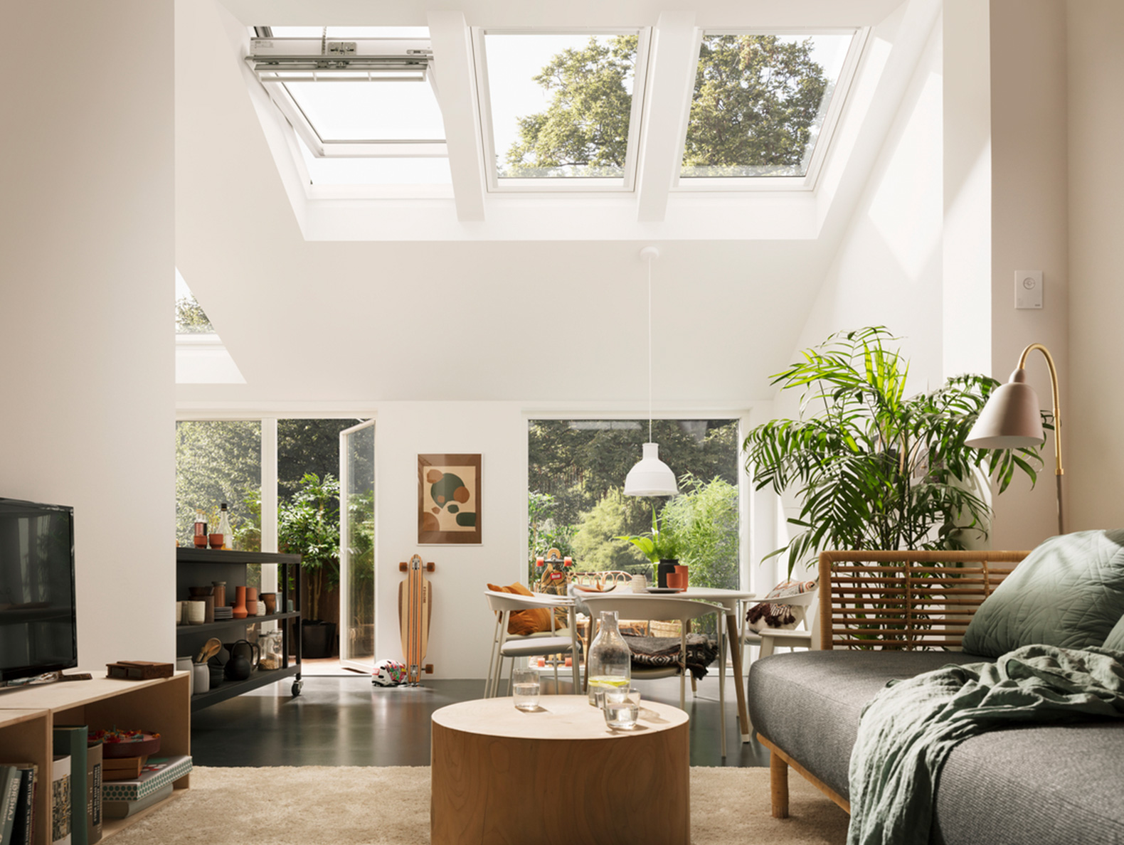 White home with stunning green views and roof windows