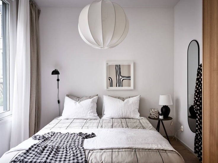 minimal nordic bedroom with graphic patterns