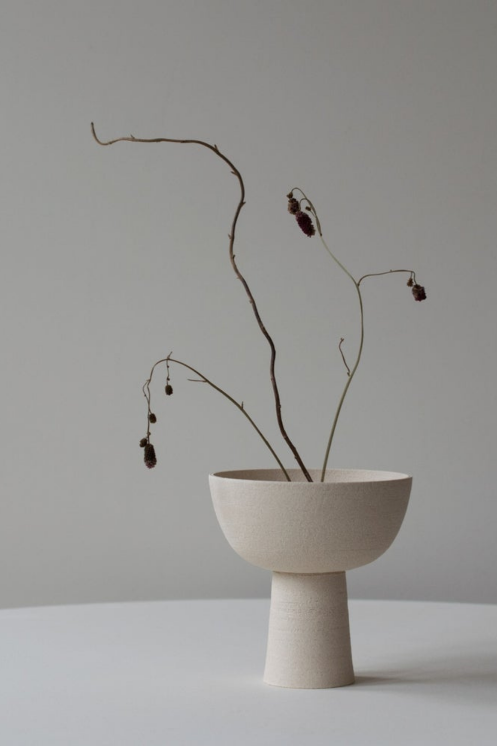 Minimal Ceramics by Tracy Dixon Ceramics- a ceramic bowl with branches still life product shot