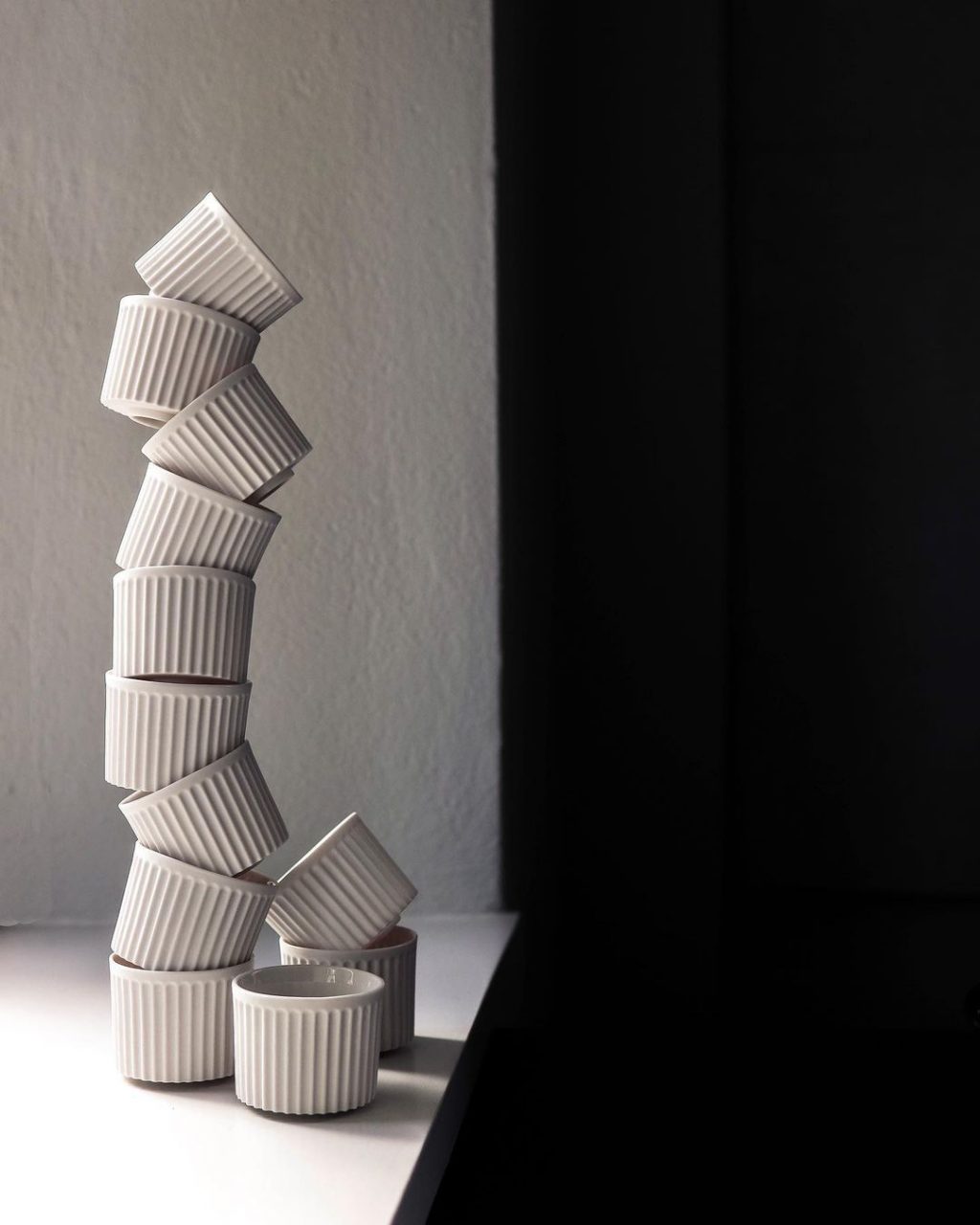 ceramic cups shown in a sculptural tower form showcasing new designs from Danish brand Subjective